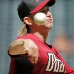 Arizona Diamondbacks pitcher Bronson Arroyo throws during the first inning of an exhibition spring training baseball game against the Chicago Cubs, Saturday, March 29, 2014, in Phoenix. (AP Photo/Matt York)