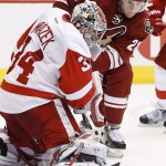 Detroit Red Wings' Petr Mrazek (34), of the Czech Republic, makes a save on a shot by Arizona Coyotes' Lauri Korpikoski (28), of Finland, during the second period of an NHL hockey game Saturday, Feb. 7, 2015, in Glendale, Ariz. (AP Photo/Ross D. Franklin)