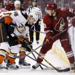 Anaheim Ducks' Jiri Sekac (46), of the Czech Republic, arrives to try to take the puck away from Arizona Coyotes' Craig Cunningham (22) during the first period of an NHL hockey game Tuesday, March 3, 2015, in Glendale, Ariz. (AP Photo/Ross D. Franklin)