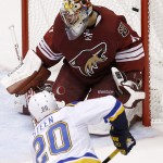 St. Louis Blues' Alexander Steen (20) scores a goal against Arizona Coyotes' Mike Smith during the second period of an NHL hockey game Saturday, Oct. 18, 2014, in Glendale, Ariz. (AP Photo/Ross D. Franklin)