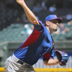 Chicago Cubs pitcher Jason Hammel throws during the first inning of an exhibition spring training baseball game against the Arizona Diamondback , Saturday, March 29, 2014, in Phoenix. (AP Photo/Matt York)