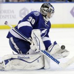 Tampa Bay Lightning goalie Ben Bishop (30) makes a save on a shot by the Arizona Coyotes during the third period of an NHL hockey game Tuesday, Oct. 28, 2014, in Tampa, Fla. (AP Photo/Chris O'Meara)