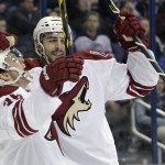Arizona Coyotes' Brendan Shinnimin, left, and Lucas Lessio celebrate a goal against the Columbus Blue Jackets during the first period of an NHL hockey game Tuesday, Feb. 3, 2015, in Columbus, Ohio. (AP Photo/Jay LaPrete)
