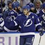 Tampa Bay Lightning center Valtteri Filppula (51), of Finland, celebrates with the bench after scoring against the Arizona Coyotes during the first period of an NHL hockey game Tuesday, Oct. 28, 2014, in Tampa, Fla. (AP Photo/Chris O'Meara)