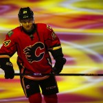 Calgary Flames' Jiri Hudler, from the Czech Republic, skates onto the ice during team introductions for an NHL hockey game against the Arizona Coyotes on Thursday, Nov. 13, 2014, in Calgary, Alberta. (AP Photo/The Canadian Press, Jeff McIntosh)