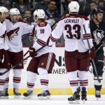 Phoenix Coyotes' Mikkel Boedker, second from left, celebrates his goal with teammates in the second period of an NHL hockey game against the Pittsburgh Penguins in Pittsburgh, Tuesday, March 25, 2014. (AP Photo/Gene J. Puskar)
