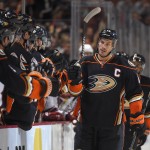 Anaheim Ducks center Ryan Getzlaf celebrates his goal with teammates on the bench during the first period of an NHL hockey game against the Arizona Coyotes, Friday, Nov. 7, 2014, in Anaheim, Calif. (AP Photo/Mark J. Terrill)