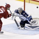 Phoenix Coyotes' Radim Vrbata (17), of the Czech Republic, gets his shot knocked away by Winnipeg Jets' Ondrej Pavelec (31), of the Czech Republic, during the shootout of an NHL hockey game, Tuesday, April 1, 2014, in Glendale, Ariz. The Jets defeated the Coyotes 2-1. (AP Photo/Ross D. Franklin)