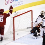 Arizona Coyotes' Mark Arcobello (36) celebrates a goal by teammate Tobias Rieder against Anaheim Ducks' Frederik Andersen (31), of Denmark, as Ducks' Nate Thompson (44) looks on during the second period of an NHL hockey game Tuesday, March 3, 2015, in Glendale, Ariz. (AP Photo/Ross D. Franklin)