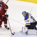 St. Louis Blues' Jake Allen (34) makes a save on a shot by Arizona Coyotes' Shane Doan (19) as Blues' Alex Pietrangelo, left, defends during the first period of an NHL hockey game Saturday, Oct. 18, 2014, in Glendale, Ariz. (AP Photo/Ross D. Franklin)