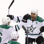 Dallas Stars' Ryan Garbutt (16) celebrates his short-handed goal against the Arizona Coyotes with teammate Trevor Daley (6) during the third period of an NHL hockey game Tuesday, Nov. 11, 2014, in Glendale, Ariz. The Stars defeated the Coyotes 4-3. (AP Photo/Ross D. Franklin)