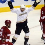 Anaheim Ducks center Andrew Cogliano (7) celebrates after scoring a first-period goal against the Phoenix Coyotes during an NHL hockey game Saturday, March 2, 2013, in Glendale, Ariz. (AP Photo/Rick Scuteri)