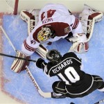 Los Angeles Kings center Mike Richards, below, shoots on Phoenix 
Coyotes goalie Mike Smith during the first period in Game 4 of the 
NHL hockey Stanley Cup Western Conference finals, Sunday, May 20, 
2012, in Los Angeles. (AP Photo/Mark J. Terrill)