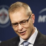 Winnipeg Jets head coach Paul Maurice smiles during a post game news conference following the team's win over the Phoenix Coyotes during NHL hockey action in Winnipeg, Canada, Monday, Jan. 13, 2014. (AP Photo/The Canadian Press, Trevor Hagan)
