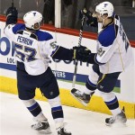 St. Louis Blues' Patrik Berglund (21), of Sweden, celebrates his goal against the Phoenix Coyotes with teammate David Perron (57) in the second period of an NHL hockey game, Thursday, March 7, 2013, in Glendale, Ariz. (AP Photo/Ross D. Franklin)