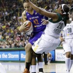 Seattle Storm's Camille Little (20) is fouled by Phoenix Mercury's Brittney Griner in the first half of a WNBA basketball game, Sunday, June 2, 2013, in Seattle. (AP Photo/Elaine Thompson)