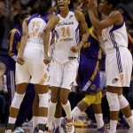 
Phoenix Mercury's Briana Gilbreath (15), DeWanna Bonner (24), and Krystal Thomas celebrate in the closing minutes of their win against the Los Angeles Sparks during the second half in a WNBA basketball game on Friday, June 14, 2013, in Phoenix. The Mercury defeated the Sparks 97-81. (AP Photo/Ross D. Franklin)