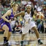Seattle Storm's Temeka Johnson (2) tries to drive past Phoenix Mercury's Samantha Prahalis in the first half of a WNBA basketball game, Sunday, June 2, 2013, in Seattle. (AP Photo/Elaine Thompson)