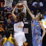 Chicago Sky's Elena Delle Donne, right, blocks the shot of Phoenix Mercury's DeWanna Bonner (24) as the Sky's Epiphanny Prince (10) looks on in the second half during a WNBA basketball game on Monday, May 27, 2013, in Phoenix. The Sky defeated the Mercury 102-80. (AP Photo/Ross D. Franklin)