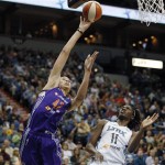 Phoenix Mercury center Brittney Griner (42) shoots against Minnesota Lynx forward Amber Harris (11) in the second half of a WNBA basketball game, Thursday, June 6, 2013, in Minneapolis. The Lynx won 99-79. (AP Photo/Stacy Bengs)