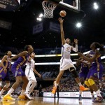 Phoenix Mercury's Brittney Griner (42) scores against the Los Angeles Sparks during the first half in a WNBA basketball game on Friday, June 14, 2013, in Phoenix. (AP Photo/Ross D. Franklin)