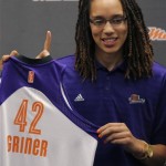 Phoenix Mercury's Brittney Griner, the No. 1 overall pick the WNBA draft, holds a team jersey during a news conference Saturday, April 20, 2013, in Phoenix. (AP Photo/Matt York)
