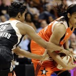 East's Angel McCoughtry, left, of the Atlanta Dream, pressures West's Maya Moore, of the Minnesota Lynx, during the first half of the WNBA All-Star basketball game in Uncasville, Conn., Saturday, July 27, 2013. (AP Photo/Jessica Hill)
