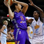 Phoenix Mercury's Ewelina Kobryn works against Chicago Sky's Jessica Breland during the first half of Game 3 of the WNBA basketball finals, Friday, Sept. 12, 2014, in Chicago. (AP Photo/Kamil Krzaczynski)