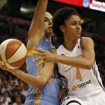 Phoenix Mercury forward Candice Dupree (4) looks to pass on Chicago Sky forward Elena Delle Donne (11) in the first half of Game 1 of the WNBA basketball finals, Sunday, Sept. 7, 2014, in Phoenix. (AP Photo/Rick Scuteri)