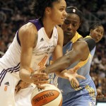 Chicago Sky center Sylvia Fowles (34) and Phoenix Mercury forward Candice Dupree (4) battle for the ball in the second half of Game 1 of the WNBA basketball finals, Sunday, Sept. 7, 2014, in Phoenix. The Mercury defeated the Sky 83-62. (AP Photo/Rick Scuteri)