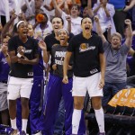  Phoenix Mercury's Eshaya Murphy, Ewelina Kobryn, Tiffany Bias, and Mistie Bass, froim left, cheer on their teammates during the first half of Game 3 in the WNBA Western Conference basketball finals against the Minnesota Lynx on Tuesday, Sept. 2, 2014, in Phoenix. (AP Photo/Ross D. Franklin)