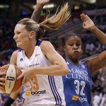  Phoenix Mercury's Penny Taylor (13), of Australia, pulls down a rebound in front of Minnesota Lynx's Rebekkah Brunson (32) during the first half of Game 3 in the WNBA Western Conference basketball finals Tuesday, Sept. 2, 2014, in Phoenix. (AP Photo/Ross D. Franklin)
