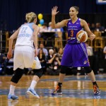 Phoenix Mercury's Diana Taurasi calls to her teammates as Chicago Sky's Courtney Vandersloot defends during the first half of Game 3 of the WNBA Finals basketball series, Friday, Sept. 12, 2014, in Chicago. (AP Photo/Kamil Krzaczynski)