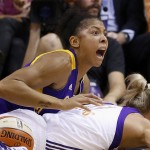 Los Angeles Sparks' Candace Parker shouts as she is called for a foul on Phoenix Mercury's Erin Phillips during the second half in Game 1 of the WNBA basketball Western Conference semifinals, Friday, Aug. 22, 2014, in Phoenix. The Mercury defeated the Sparks 75-72. (AP Photo/Ross D. Franklin)