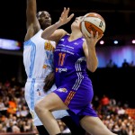 Phoenix Mercury's Ewelina Kobryn shoots against Chicago Sky's Sylvia Fowles during the first half of Game 3 of the WNBA Finals basketball series, Friday, Sept. 12, 2014, in Chicago. (AP Photo/Kamil Krzaczynski)
