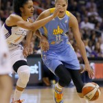 Chicago Sky forward Elena Delle Donne (11) drives against Phoenix Mercury forward Candice Dupree during the second half of Game 2 of the WNBA basketball finals, Tuesday, Sept. 9, 2014, in Phoenix. (AP Photo/Matt York)