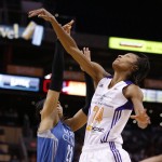  Phoenix Mercury's DeWanna Bonner (24) blocks the shot of Minnesota Lynx's Maya Moore (23) during the first half of Game 3 in the WNBA Western Conference basketball finals Tuesday, Sept. 2, 2014, in Phoenix. (AP Photo/Ross D. Franklin)