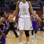 Phoenix Mercury's Penny Taylor (13), of Australia, argues with officials after being called for a foul on Los Angeles Sparks' Alana Beard, left, during the first half in Game 1 of the WNBA basketball Western Conference semifinals Friday, Aug. 22, 2014, in Phoenix. (AP Photo/Ross D. Franklin)