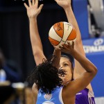 Chicago Sky's Epiphanny Prince shoots against Phoenix Mercury's Ewelina Kobryn during the first half of Game 3 of the WNBA Finals basketball series, Friday, Sept. 12, 2014, in Chicago. (AP Photo/Kamil Krzaczynski)