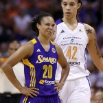 Los Angeles Sparks' Kristi Toliver (20) grimaces after turning the ball over, in front of Phoenix Mercury's Brittney Griner (42) during the second half in Game 1 of the WNBA basketball Western Conference semifinals Friday, Aug. 22, 2014, in Phoenix. The Mercury defeated the Sparks 75-72. (AP Photo/Ross D. Franklin)