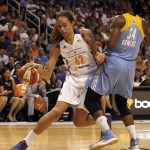 Phoenix Mercury center Brittney Griner (42) drives on Chicago Sky center Sylvia Fowles (34) in the first half of Game 1 of the WNBA basketball finals, Sunday, Sept. 7, 2014, in Phoenix. (AP Photo/Rick Scuteri)