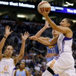 Phoenix Mercury guard Diana Taursai shoots over Chicago Sky forward Elena Delle Donne (11) during the first half of Game 2 of the WNBA basketball finals, Tuesday, Sept. 9, 2014, in Phoenix. (AP Photo/Matt York)