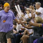 Phoenix Mercury fans celebrate during the first half of Game 2 of the WNBA basketball finals against the Chicago Sky, Tuesday, Sept. 9, 2014, in Phoenix. (AP Photo/Matt York)