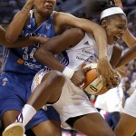  Phoenix Mercury's Eshaya Murphy, right, grabs a rebound in front of Minnesota Lynx's Damiris Dantas (34) during the first half of Game 3 in the WNBA Western Conference basketball finals Tuesday, Sept. 2, 2014, in Phoenix. (AP Photo/Ross D. Franklin)