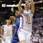 Phoenix Mercury's Penny Taylor (13), of Australia, scores against Minnesota Lynx's Maya Moore, as Mercury's Brittney Griner (42) watches during the second half in Game 1 of the WNBA Western Conference finals Friday, Aug. 29, 2014, in Phoenix. The Mercury defeated the Lynx 85-71. (AP Photo/Ross D. Franklin)