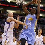Chicago Sky's Sylvia Fowles (34) shoots over Phoenix Mercury forward Penny Taylor during the second half of Game 2 of the WNBA basketball finals, Tuesday, Sept. 9, 2014, in Phoenix. (AP Photo/Matt York)