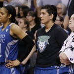  Minnesota Lynx's Maya Moore, Janel McCarville, and Lindsay Whalen, from left, watch the closing moments from the bench in Game 3 in the WNBA Western Conference basketball finals Tuesday, Sept. 2, 2014, in Phoenix. The Mercury defeated the Lynx 96-78, winning the series and advancing to the WNBA Finals. (AP Photo/Ross D. Franklin)