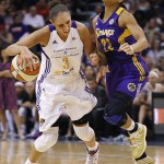 Phoenix Mercury's Diana Taurasi (3) fouls Los Angeles Sparks' Armintie Herrington (22) during the second half in Game 1 of the WNBA basketball Western Conference semifinals Friday, Aug. 22, 2014, in Phoenix. The Mercury defeated the Sparks 75-72. (AP Photo/Ross D. Franklin)