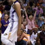 Phoenix Mercury's Diana Taurasi yells after scoring and being fouled on the by Los Angeles Sparks' Kristi Toliver during the second half in a WNBA basketball game on Friday, June 14, 2013, in Phoenix. The Mercury defeated the Sparks 97-81. (AP Photo/Ross D. Franklin)