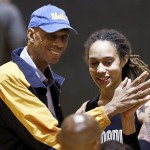 Phoenix Mercury rookie center Brittney Griner, right, compares hand sizes with NBA Hall of Fame player and all-time leading scorer Kareem Abdul-Jabbar at the Mercury basketball practice court on Wednesday, May 15, 2013, in Phoenix. (AP Photo/Ross D. Franklin)